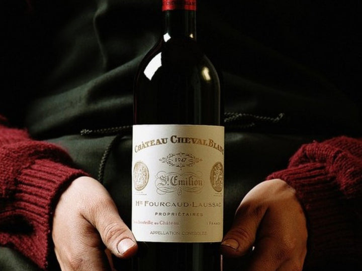 Chateau Cheval Blanc bottle — Toni Mascarenhas, CC BY-SA 4.0; cropped to 4:3